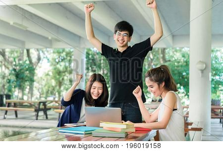 Young Students Group CompleteFinish Reading Book in Classroom Lesson Education Concept