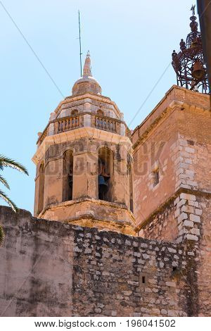 View Of The Tower Of The Church Of Sant Bartomeu And Santa Tecla In Sitges, Barcelona, Catalunya, Sp