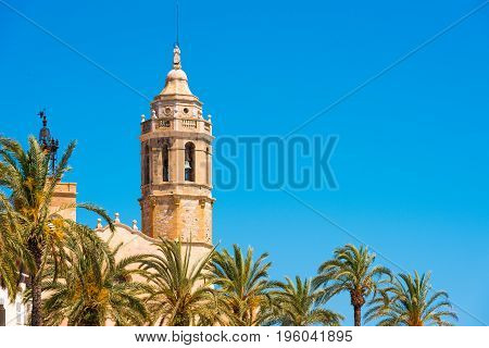 View Of The Tower Of The Church Of Sant Bartomeu And Santa Tecla In Sitges,  Barcelona, Catalunya, S
