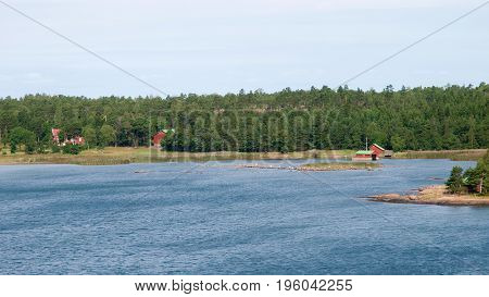 Swedish red houses along the shore of the baltic sea