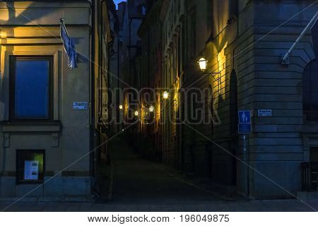 STOCKHOLM, SWEDEN - JULY 7, 2016: This is the embankment Skeppsbron on Gamla Stan at night.