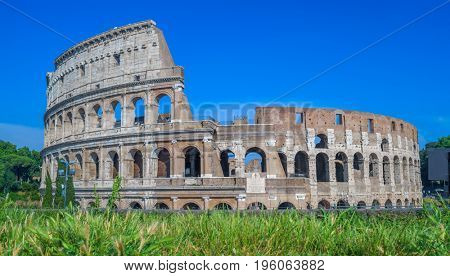 Colosseum ruins on summer sunny day. The main tourist attraction in Rome, Italy.