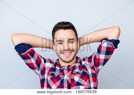 Time To Rest. Close Up Cropped Photo Of Young Freelancer With Beaming Smile, Relaxing, His Hands Are
