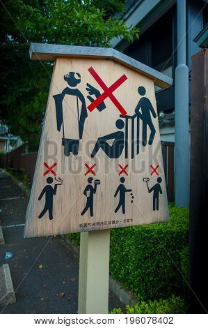 HAKONE, JAPAN - JULY 02, 2017: Informative sign that can not be allow, smoking, eat, take selfies and throw garbage, in Kyoto, Japan