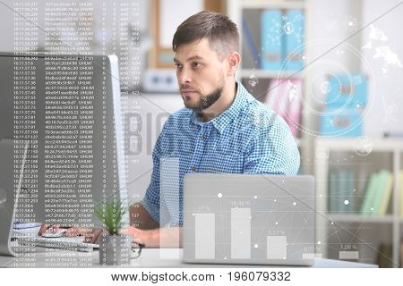 Concept of management information systems. Man working with computer at table in office