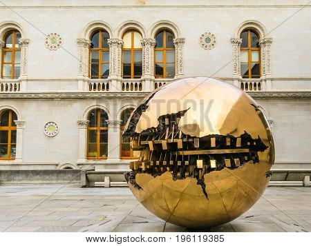 The Sphere Within Sphere, Sculpture Of The Italian Sculptor Arnaldo Pomodoro.trinity College, Dublin