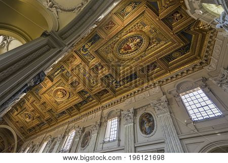 The ceiling with gold details in Basilica di San Giovanni in Laterano (St. John Lateran basilica). Italy Rome June 2017