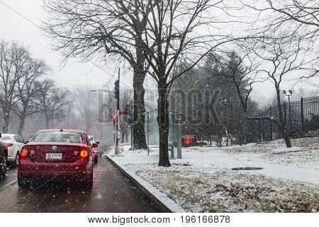 Washington Dc, Usa - January 7, 2017: Winter Snow Storm On Road With Stopped Cars And Us Naval Obser