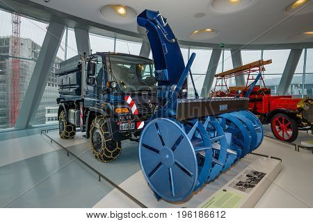 STUTTGART GERMANY- MARCH 19 2016: Mercedes-Benz Unimog U500 with winter-service equipment 2004. Mercedes-Benz Museum.