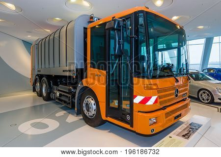 STUTTGART GERMANY- MARCH 19 2016: The refuse collection truck Mercedes-Benz Econic 2628 NGT 2005. Mercedes-Benz Museum.