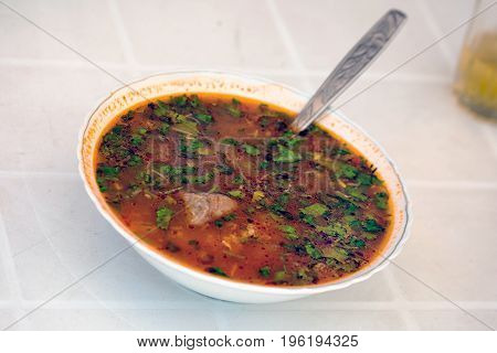 Soup kharcho traditional georgian soup with meat and rice.