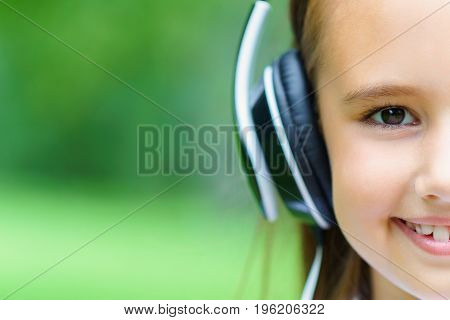 Copy Space And Hulf Face Of Young Attractive Caucasian Girl Listening Music With Professional Dj Hea