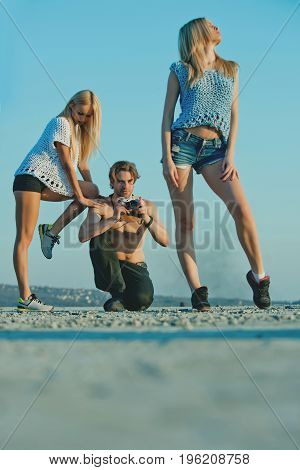 Man With Muscular Body With Twins.