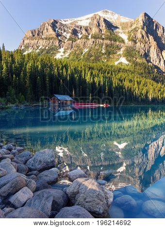 Turquoise Lake Louise and the Boathouse with Canoes, Banff National Park, Canada