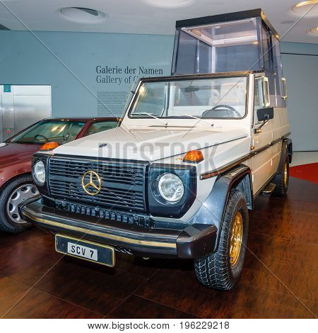 STUTTGART GERMANY- MARCH 19 2016: Mercedes-Benz 230G Papamobil 1980. A special armored vehicle for the transportation of Pope (Bishop of Rome). Mercedes-Benz Museum.