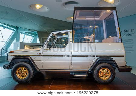 STUTTGART GERMANY- MARCH 19 2016: Mercedes-Benz 230G Papamobil 1980. A special armored vehicle for the transportation of Pope (Bishop of Rome). Mercedes-Benz Museum.