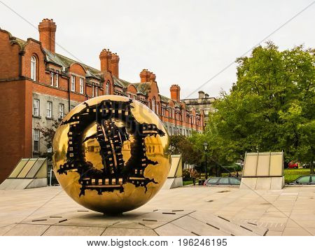 The Sphere Within Sphere, Sculpture Of The Italian Sculptor Arnaldo Pomodoro.trinity College, Dublin