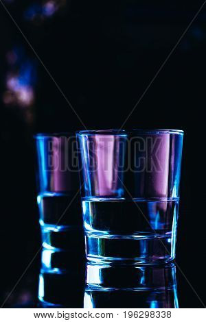 drinking glasses close-up on a dark background.
