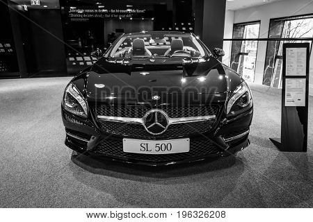 BERLIN - JANUARY 24 2015: Sports car Mercedes-Benz SL500 (R231). Black and white. Produced since 2012.