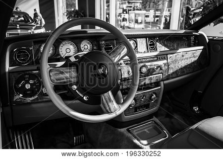 BERLIN - MARCH 08 2015: Showroom. Cabin of a luxury car Rolls-Royce Phantom Drophead Coupe. Black and white. Rolls-Royce Motor Cars Limited global manufacturer of luxury cars.