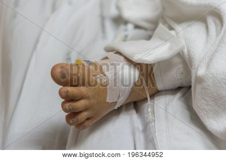 Patient In The Hospital With Saline Intravenous