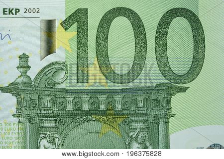 Green one hundred of euro bank note