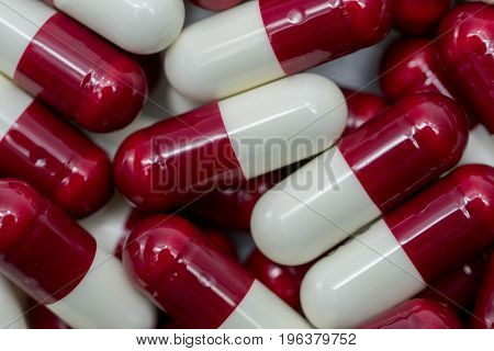 Top view of red white capsule pills