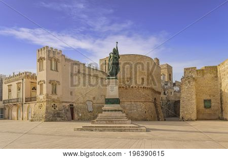 The most beautiful old towns of Italy. Apulia: historical center of Otranto in Salento. Promenade of Heroes: medieval tower and monument erected for martyrs ( Monument erected to the Heroes and Martyrs of 1480).