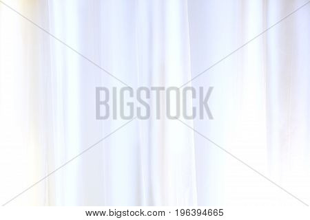 Close-Up Of White Curtain Or Drapes For Background Used For Montage Product Display Or Design Visual Layout Transparent White Curtain Waving On The Background Beautiful Horizontal Wallpaper With Copyspace