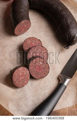 Black pudding or blood sausage shot with low key lighting