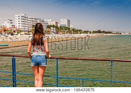Young Tourist Woman Looking At Medieval Castle In Larnaca,cyprus