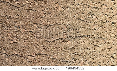 The texture of asphalt with small stones