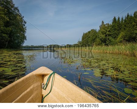 Idyllic waterways connecting the lakes of finland between lush green forests