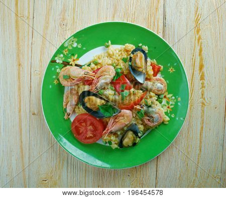 Mexican Dish Prepared With White Rice And Seafood.