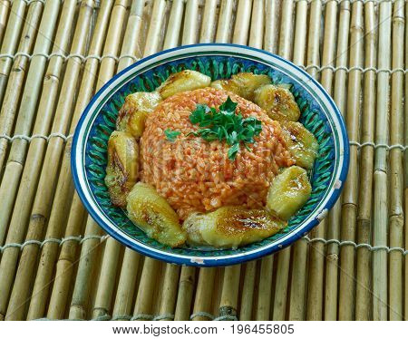 jollof rice with fried plantains. Nigerian cuisine