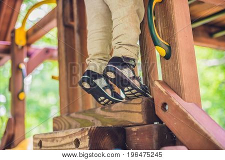 Children's Orthopedic Shoes On The Boy's Feet