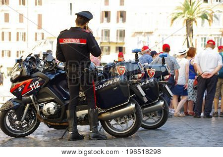 Rome, Italy - June 15 2017: Carabinieri military officer on duty in Spanish Steps in Rome, Italy