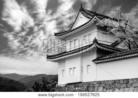Black and white of the historical Nijo Castle guard tower in Kyoto, Japan