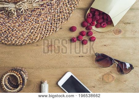 Summer Holiday, Vacation, Relaxation Concept. Raspberries, Straw Hat, Smartphone, Sunglasses From Ab