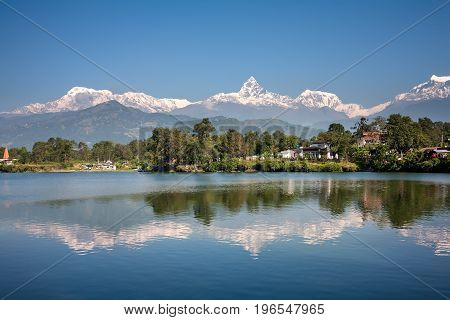 View At Annapurna Mountain Range And Its Reflection In Phewa Lake In Pokhara, Nepal