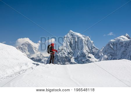 Trekker is walking by Renjo La pass in Everest region
