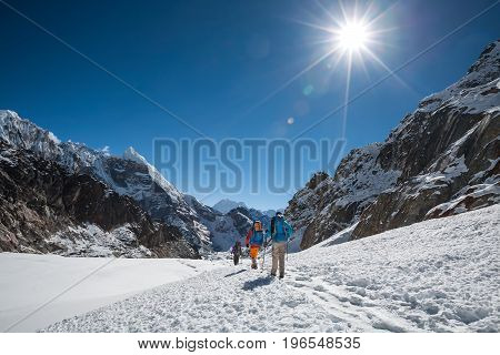Trekkers crossing Cho La pass in Everest region Nepal