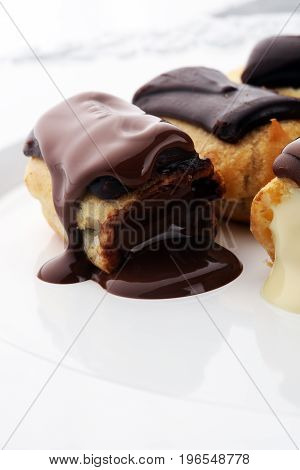 Traditional French Dessert. Eclair With Chocolate Icing. Pastery