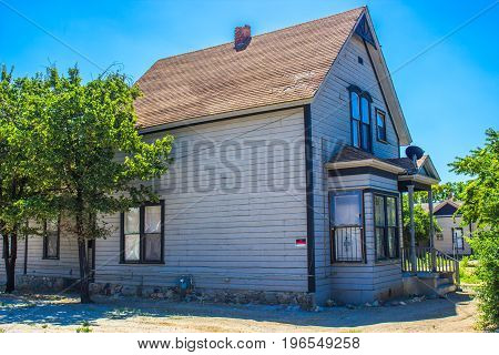 Abandoned Two Story Home With No Trespassing Sign
