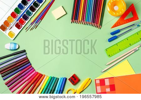 School background. Various school supplies on a desktop, copy space, top view