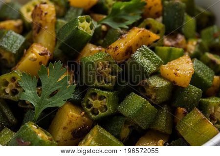 Indian masala fried bhindi or bhendi or Okra or ladyfinger curry or sabji, selective focus