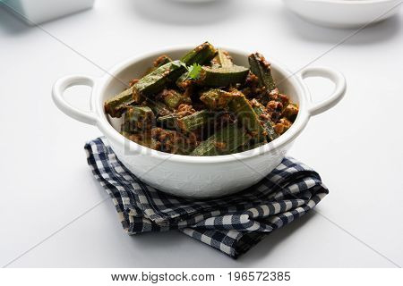 Indian masala fried bhindi or bhendi or Okra or ladyfinger curry or sabji, selective focus