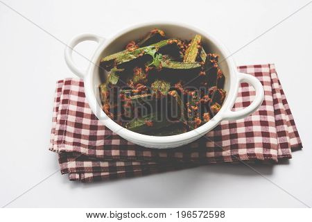 Indian masala fried bhindi or bhendi or Okra or ladyfinger curry or sabji, selective focus