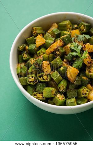 Indian masala fried bhindi or bhendi or Okra or ladyfinger curry or sabji, selective focus