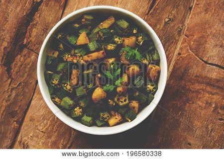 Indian masala fried bhindi or bhendi or Okra or ladyfinger curry or sabji, selective focus